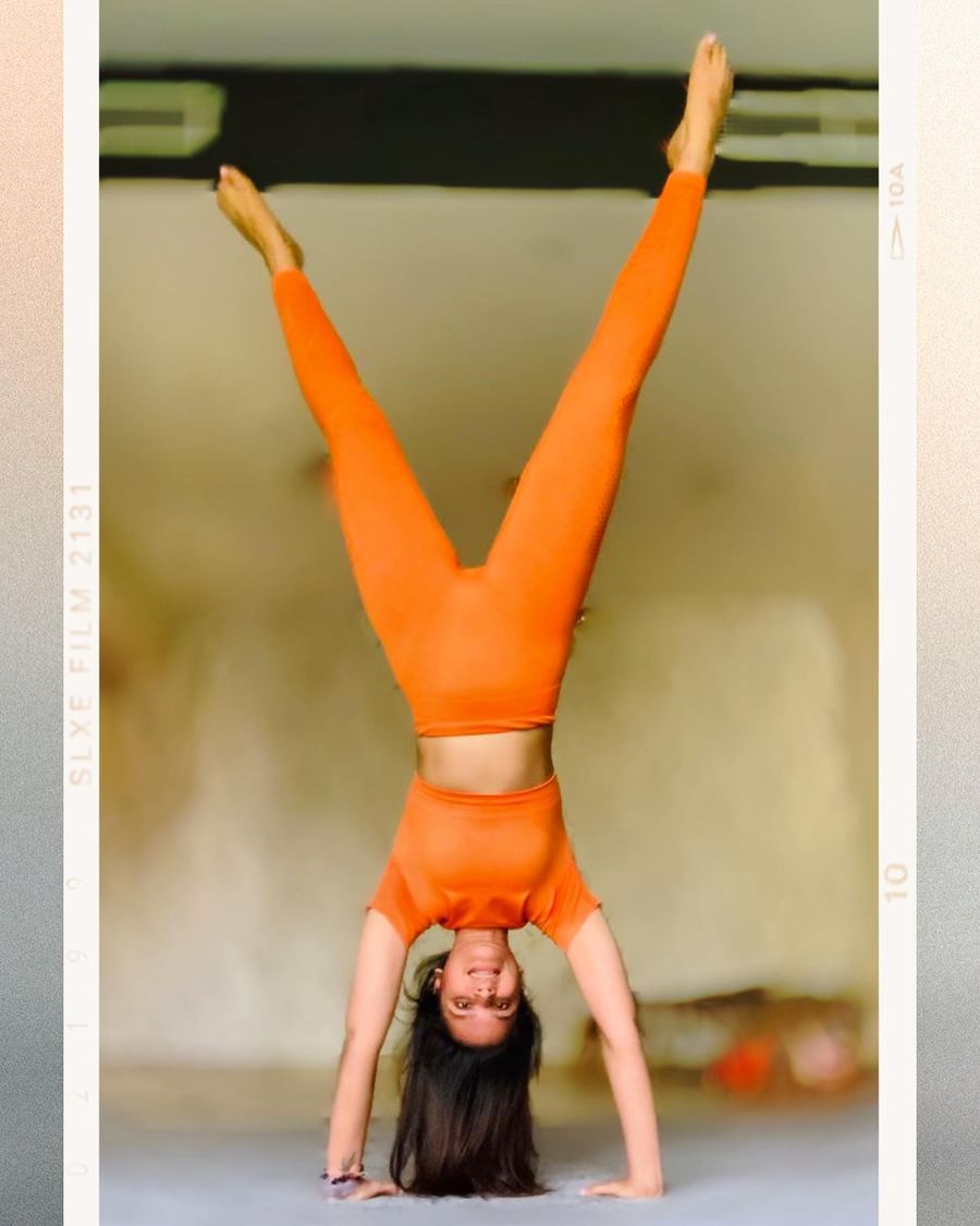 Aastha Chopra in Straddle handstand (Adho Mukha Vrksasana), Home, Dubai, August 2020