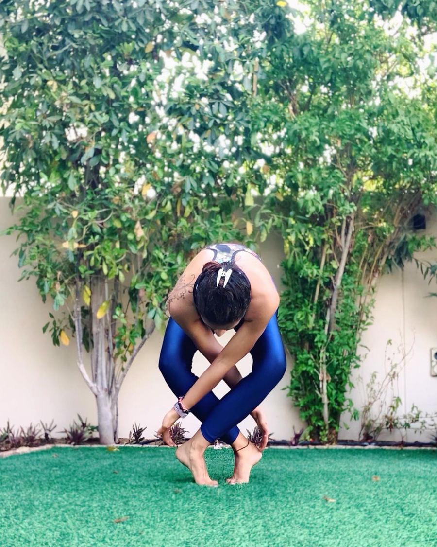 Aastha Chopra in Lattice pose (Crossed-leg fold), Garden, Dubai, August 2020