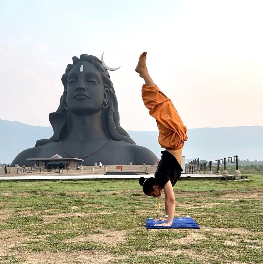 Aastha Chopra in Handstand before Adiyogi (Adho Mukha Vrksasana), Isha, Coimbatore, India, March 2023