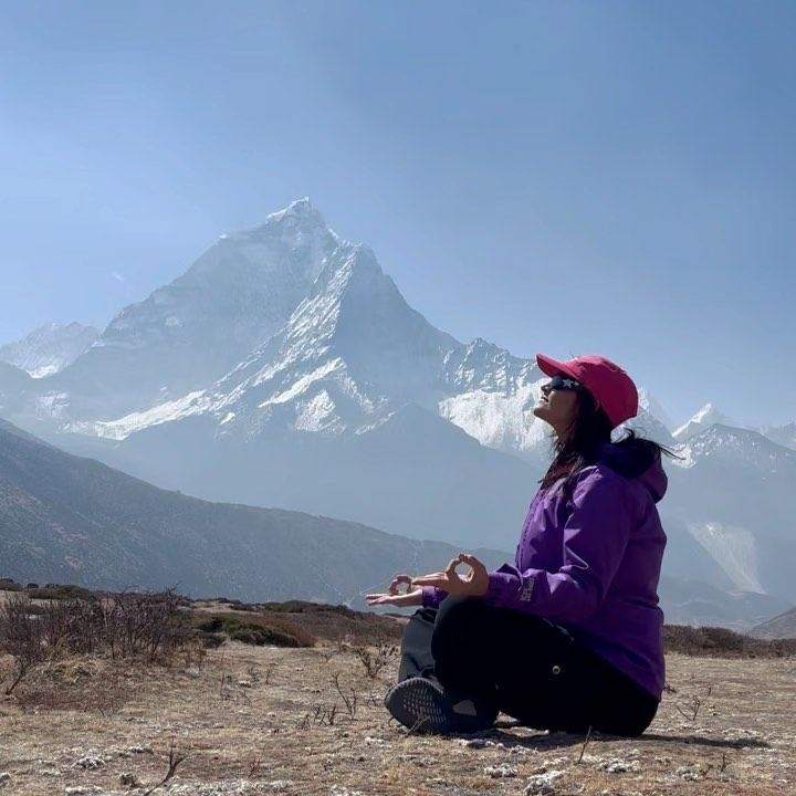 Aastha Chopra in Meditation on the Everest trail (Sukhasana, Gyan mudra), Everest Base Camp, 5,364 metres, Nepal, April 2023