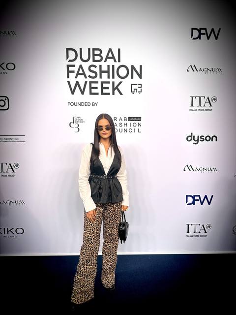 Opening show of Dubai Fashion Week FW25/26 at d3, a Rizman Ruzaini runway, wearing Ganni.