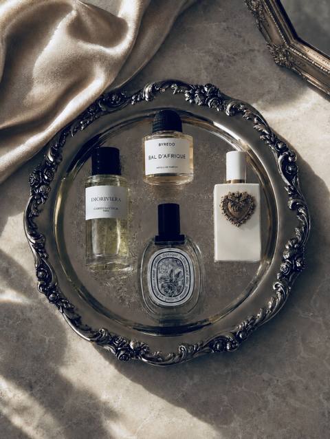 My summer rotation: Byredo Bal d'Afrique, D&G Devotion, Dior Dioriviera, Hermès Le Jardin de Monsieur Li and a Diptyque.