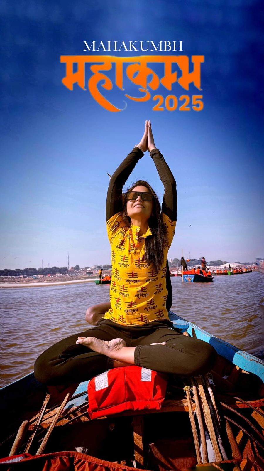 Aastha Chopra in Lotus at the Maha Kumbh (Padmasana, arms raised), Triveni Sangam, Prayagraj, India, January 2025
