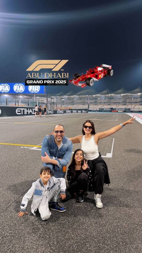 Walking the Abu Dhabi Grand Prix pit lane at Yas Marina with the kids, December 2025